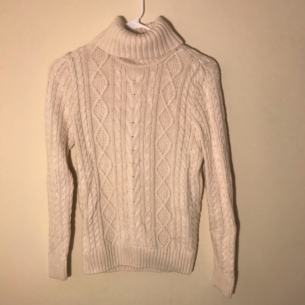 Beautiful warm kids sweater in cream.